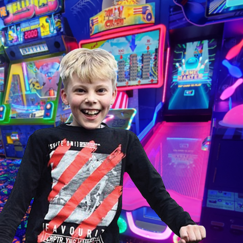 child ready for fun in arcade child ready for fun in arcade